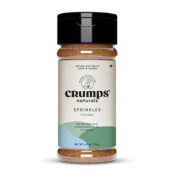 A close-up of Crumps - Chicken Sprinkles packaging, highlighting 100% real chicken, high-protein benefits, and meal-enhancing properties.