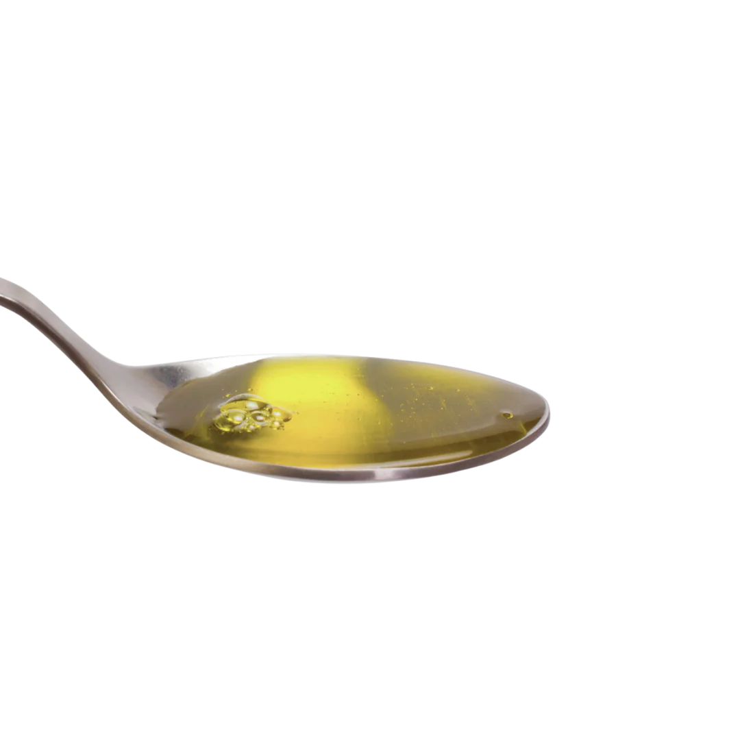 A spoonful of Ahiflower Oil, showcasing its smooth consistency, easy absorption, and powerful omega-3 benefits for pets.