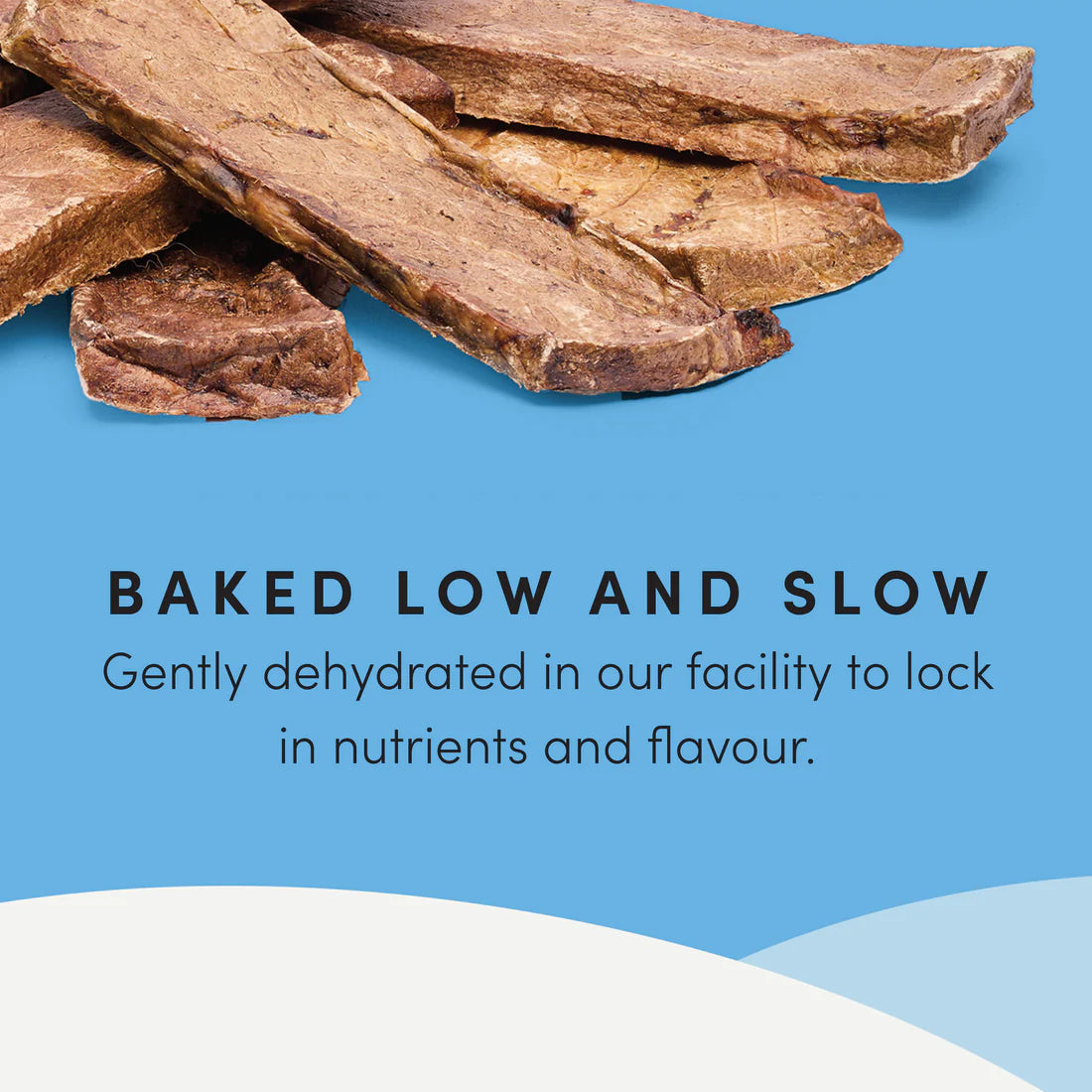 A detailed close-up of Crumps' Naturals Beef Lung Tendersticks, showing their tender, easy-to-break texture, slow-baked process, and natural beef goodness.