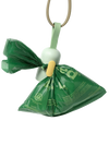 A used poop bag securely tied and hanging from a dispenser, demonstrating its strong, leak-proof design for mess-free walks.