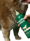 Earth Rated 3-in-1 Shampoo for Double Coated Dogs showing how the nozzle penetrates through thick double coated dogs