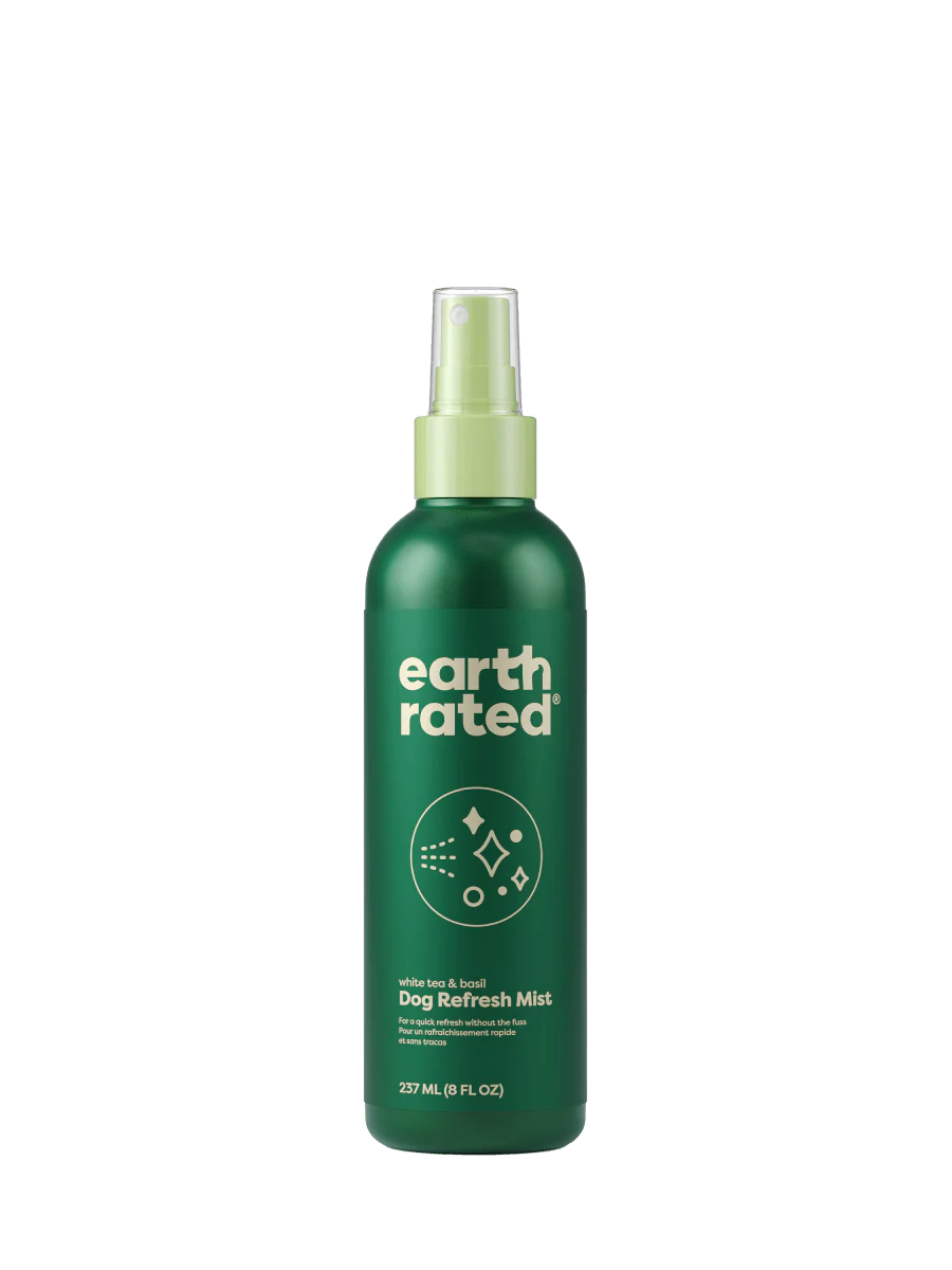 Earth Rated Dog Refresh Mist bottle featuring deodorizing spray for hydrating, eliminating odor, and detangling a dog’s coat.