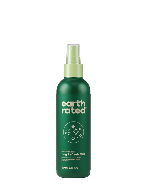 Earth Rated Dog Refresh Mist bottle featuring deodorizing spray for hydrating, eliminating odor, and detangling a dog’s coat.