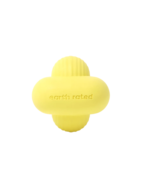 Earth Rated Fetch Toy made from natural yellow rubber with a unique shape designed for easy carrying and unpredictable bouncing.