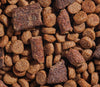 Image showing a detailed close-up of the dry food kibble and air-dried morsels, emphasizing the rich texture, high protein content, and real visible ingredients for optimal palatability.