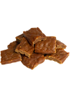 Close-up of Open Farm Dehydrated Chicken Dog Treats highlighting texture and quality.