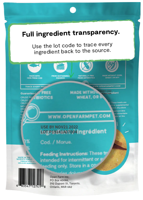 Detailed look at the back of Open Farm Dehydrated Cod Fish Dog Treats bag showing transparency in sourcing.
