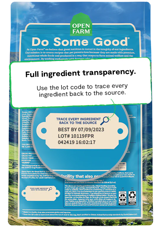 The back of the Open Farm Air-Dried Surf & Turf Dog Food bag, emphasizing the companyâs commitment to ingredient transparency, showcasing non-GMO ingredients, Wild-Caught Salmon, and humanely raised beef.