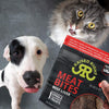 Raised Right Beef Liver Meat Bites with a dog and cat, showing excitement for these tasty treats.