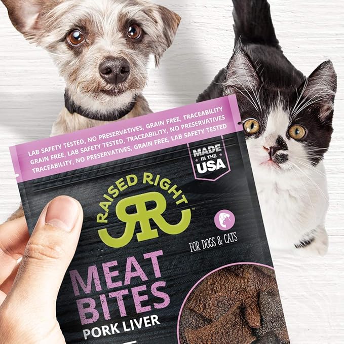 Raised Right Pork Liver Meat Bites with a dog and cat looking excited for these grain-free, human-grade treats.