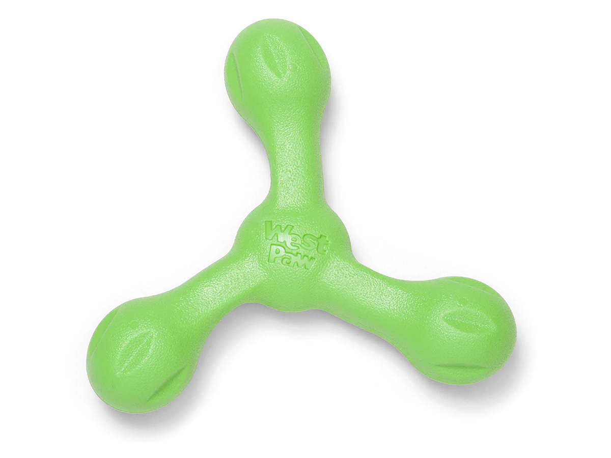 West Paw Skamp dog toy in green, a safe alternative to sticks with superior durability.