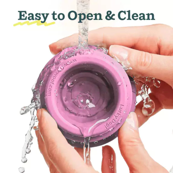 Woof Pupsicle Dog Toy in Party Pink showing it's easy to open and clean