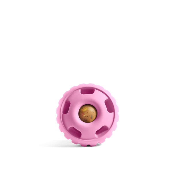 Side view of the Woof Pupsicle in Party Pink showing durable BPA-free material, easy-to-fill design, and vibrant colour for long-lasting, mess-free dog enrichment