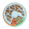 A close-up of Puppy Lickin’ Layers, showcasing the interactive spinning design and treat compartments.