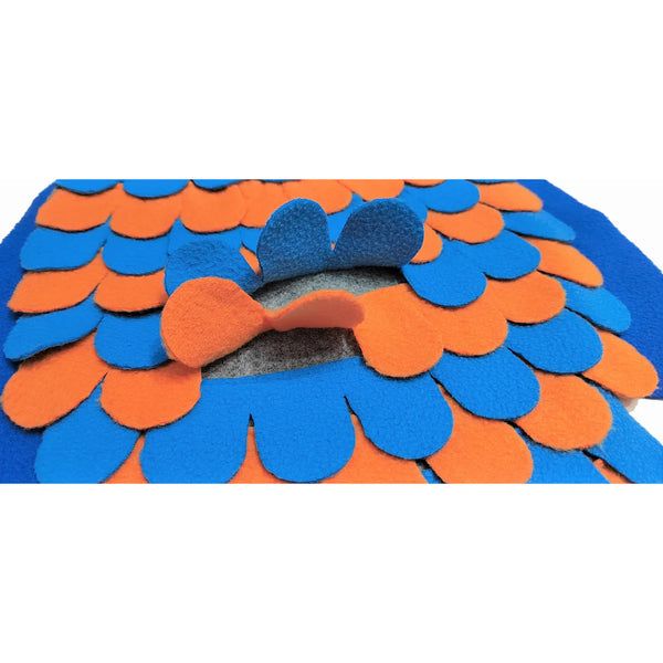 Open scales on the fish showing various hidden pockets for treats to help slow down feeding and boost mental engagement.