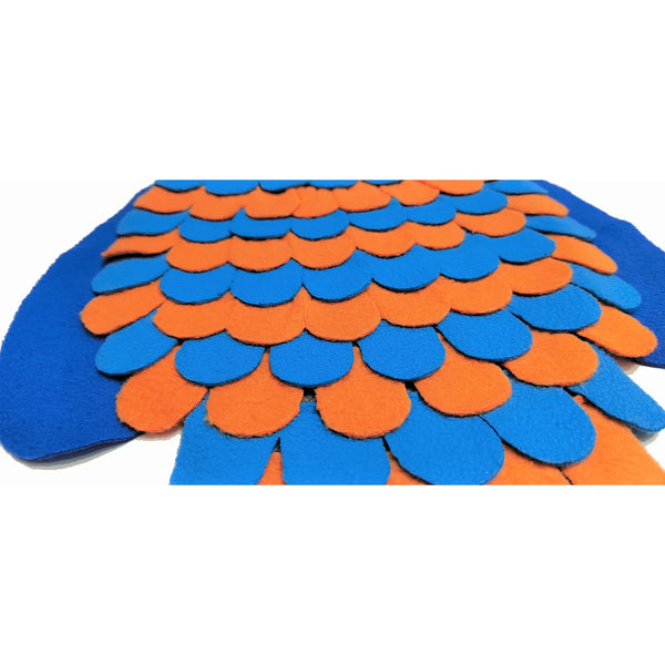 Close-up of the fish scales on the snuffle mat showcasing soft fleece material designed to hide treats and support foraging play.