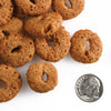 Fromm crunchy o's dog treat smokin' cheeseplosion up close showing the size and texture of these crunchy dog treats