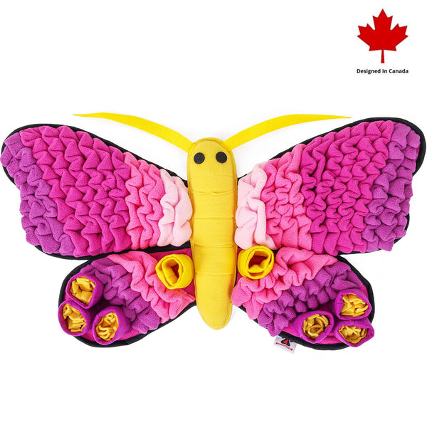A butterfly-shaped snuffle mat with multiple layers and textures, designed to stimulate foraging instincts and slow down eating.