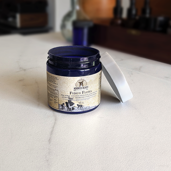 Adored Beast's Fido's Flora: Front view of the product packaging featuring a dog illustration and brand logo.