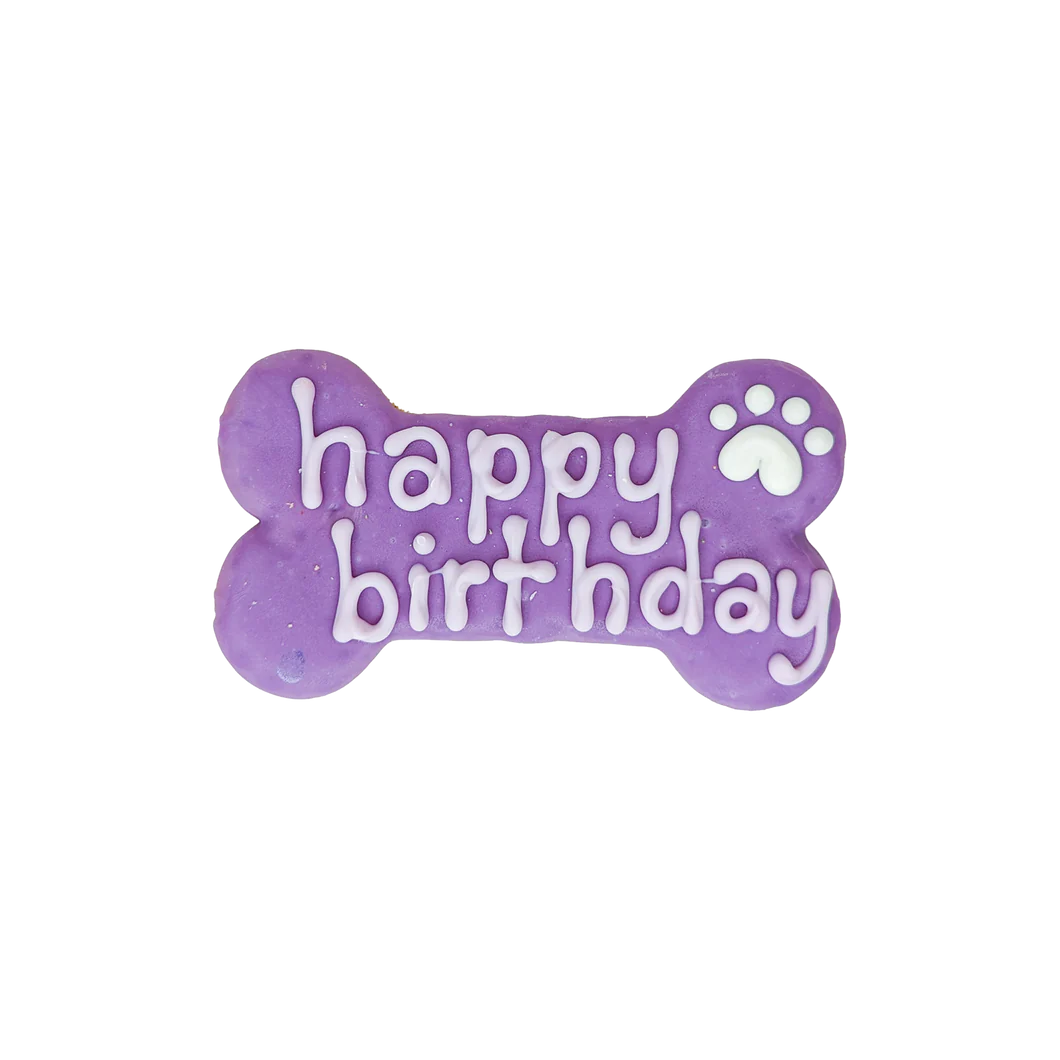 Bosco & Roxy Happy Birthday Bone in purple, a delightful treat to make your dog's birthday extra special.