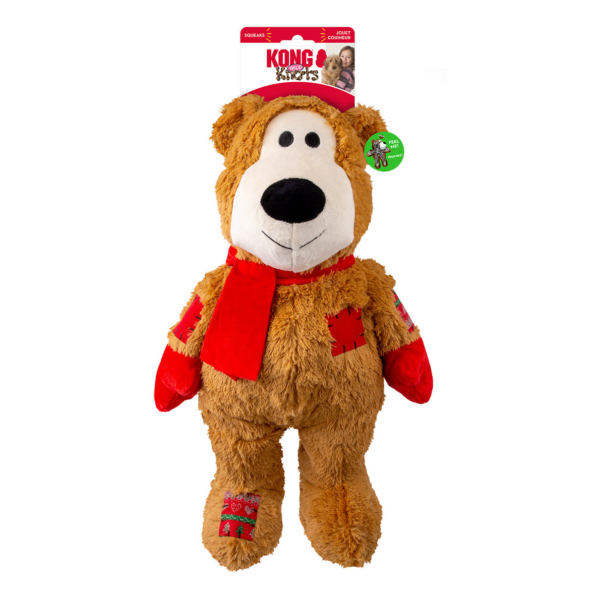 Light brown KONG Holiday Wild Knots Jumbo Bear plush dog toy with soft, durable fur, festive scarf and gloves, and a tough knotted rope skeleton inside to encourage healthy chewing and long-lasting play.