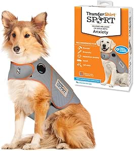 Image of a dog wearing the ThunderShirt in Platinum with packaging in the background, highlighting the drug-free calming benefits that ease stress and anxiety naturally.