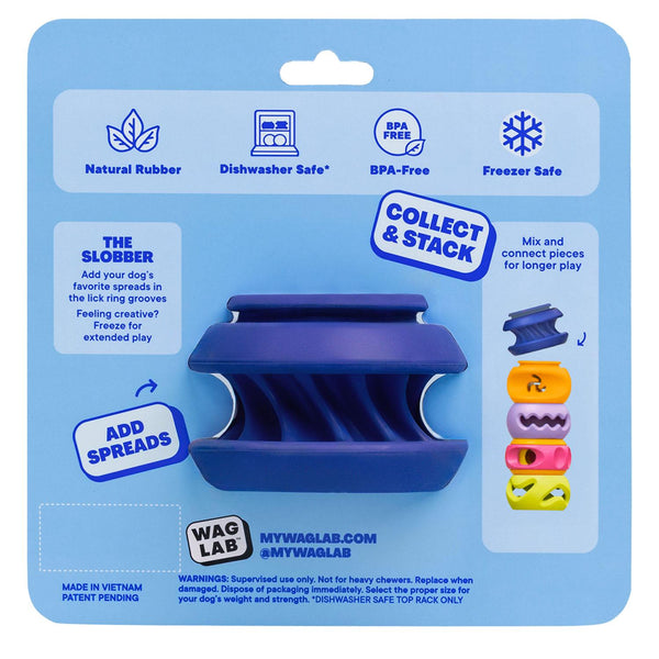 Back of WAGLAB PlayStack The Slobber Blue packaging displaying enrichment features including freezer-safe licking grooves, modular connections, dishwasher-safe cleaning, and treat-dispensing benefits