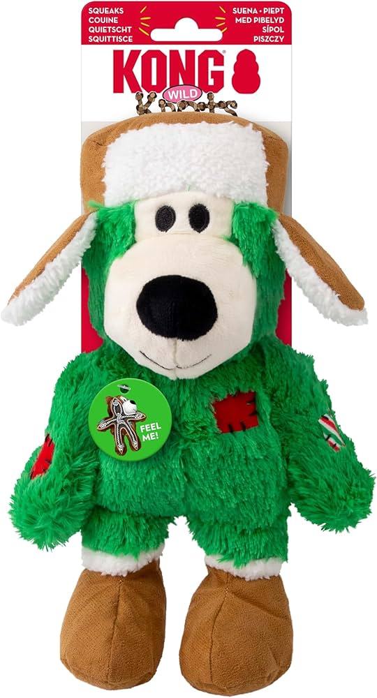 Front view of KONG Holiday Wild Knots Bear dog toy in festive colours, featuring soft plush exterior, internal knotted rope skeleton for durability, and built-in squeaker; perfect for satisfying natural chewing instincts, encouraging interactive play, and providing cozy snuggles during the holiday season.