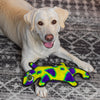Image of a happy yellow lab holding the Durablez Gecko plush toy, showcasing its size, soft texture, and suitability for fetch and cuddle time alike.