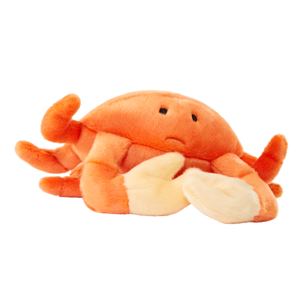 Angled view of Fluff & Tuff Phyllis Crab plush dog toy showcasing reinforced seams, lifelike crab details, and ultra-soft plush texture that provides durable, interactive, and comforting play for dogs.