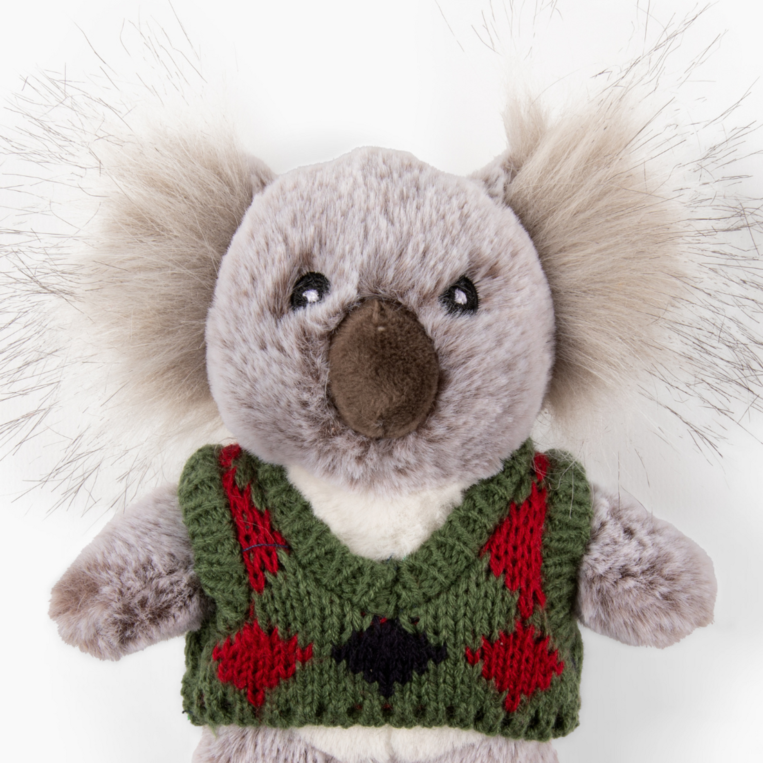 Close-up of Fluff & Tuff Pops Koala plush dog toy face showing soft plush texture, detailed stitching, and cheerful design to engage dogs in play and cuddles.