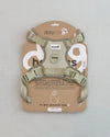 Dexypaws Sage Green No Pull Dog Harness displayed in retail packaging featuring breathable mesh padding, adjustable straps, front and back leash attachment points, reflective trim, and durable construction for comfortable everyday walks.
