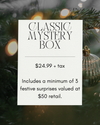 Classic Mystery Dog Box featuring festive wrapping, three hand-picked dog toys and treats valued at $50, designed to surprise and delight your pup with quality enrichment and fun.