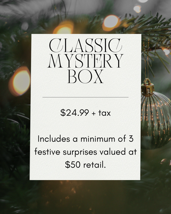 Classic Mystery Dog Box featuring festive wrapping, three hand-picked dog toys and treats valued at $50, designed to surprise and delight your pup with quality enrichment and fun.