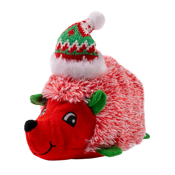 Side view of the red KONG Holiday Comfort HedgeHug showcasing its fluffy fur, durable stitching, and built-in squeaker that keeps dogs engaged while providing cozy comfort during holiday playtime.
