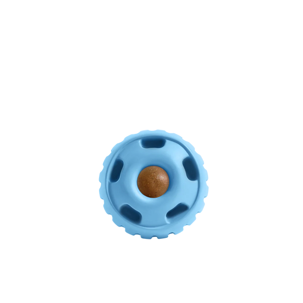 Front view of the Woof Pupsicle in Blue, showcasing its sleek design, twist-open feature, and treat compatibility for interactive play.