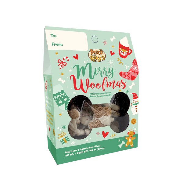 Front of the box of Bosco & Roxy Sprinkles Small Bones showing apple cinnamon-flavorued small bone-shaped treats topped with white icing and red, white, and green sprinkles; highlights the festive design, seasonal flavour, and ideal size for rewarding or snacking.