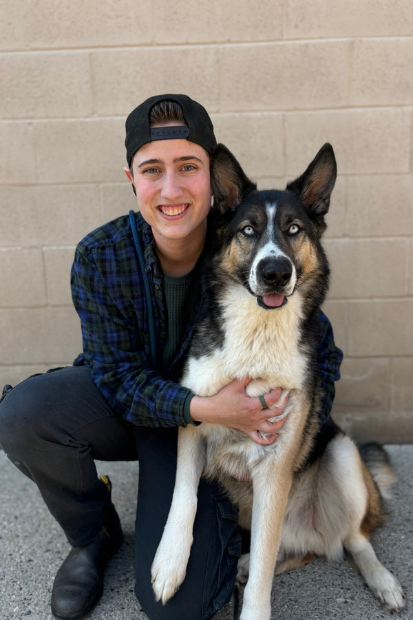 Jay, our friendly Dog Daycare Attendant, dedicated to ensuring the happiness and well-being of every pup in our care with attentive supervision and playful interactions