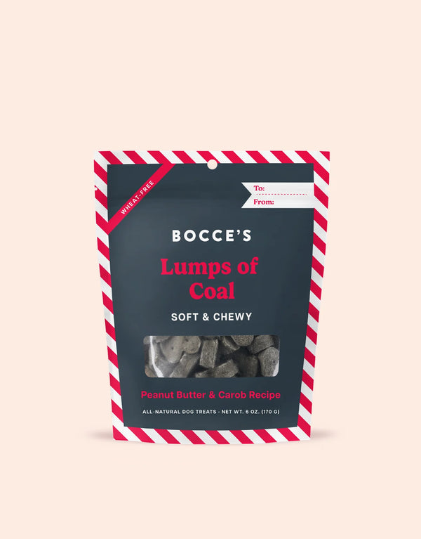 Bocce’s Bakery Lumps of Coal Soft & Chewy Dog Treats, featuring a holiday-themed bag, crafted with 100% real ingredients like peanut butter and carob.