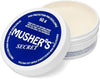 Close-up image of Musher’s Secret 60g balm container, highlighting the all-natural formula that protects paws from hot pavement, icy sidewalks, and rough terrain while keeping pads soft and moisturized.