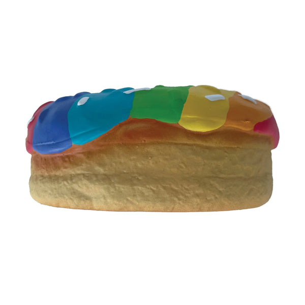 Side view of the Fou Fou Dog One Love Donut, highlighting its lifelike appearance and built-in squeaker