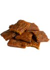 A close-up image of the dehydrated turkey treats, highlighting their texture and quality.