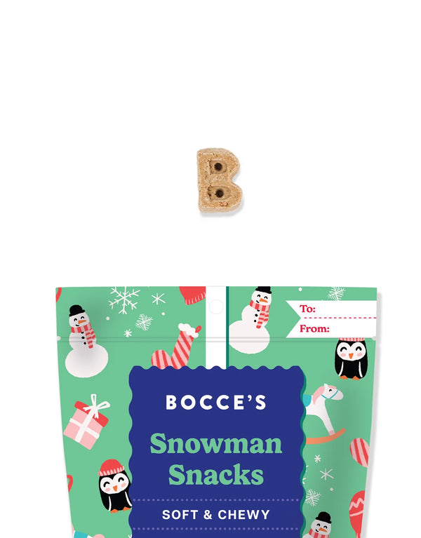 Close-up of Bocce's Bakery Snowman Snacks, showcasing soft and chewy texture and natural ingredients for a wholesome dog treat.