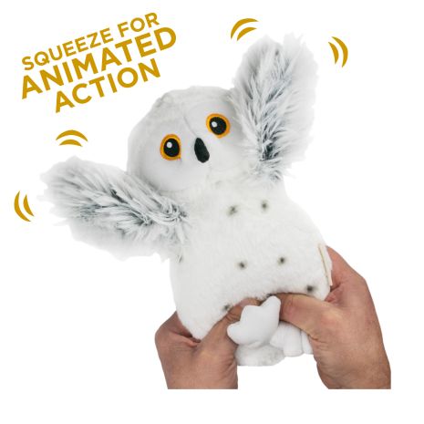 Tall Tails 8” Animated Snow Owl Plush Dog Toy showing if you squeeze the body the wings flap up and down for an animated action
