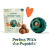 Image showing Woof’s Pupsicle Refill perfectly fitting into the Pupsicle toy for convenient and mess-free fun.