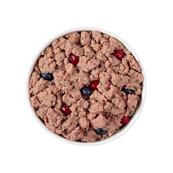 Fresh sliced beef and bison dog food served in a bowl, highlighting moist texture, high-protein ingredients for muscle support, and natural prebiotics that promote healthy digestion and overall vitality.