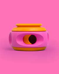 WAGLAB PlayStack The Spinner Pink and Orange dog toy without packaging showing durable natural rubber enrichment design for treat dispensing, chewing, and interactive play
