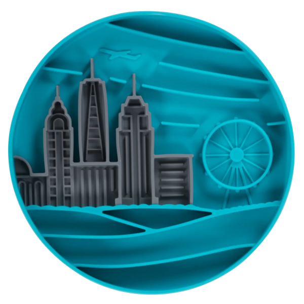 Front view of a blue silicone interactive lick bowl with raised edges and textured maze grooves designed to slow fast eating, encourage calming licking behaviour, and provide mental enrichment for dogs during meals or treats.