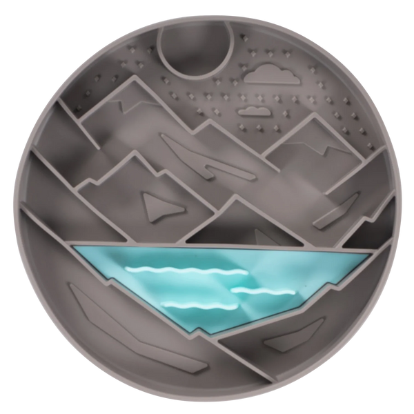 Front view of Messy Mutt silicone lick bowl showing textured maze grooves and raised edge that slow fast eating, promote calming licking therapy, and help reduce bloating while keeping wet food contained.