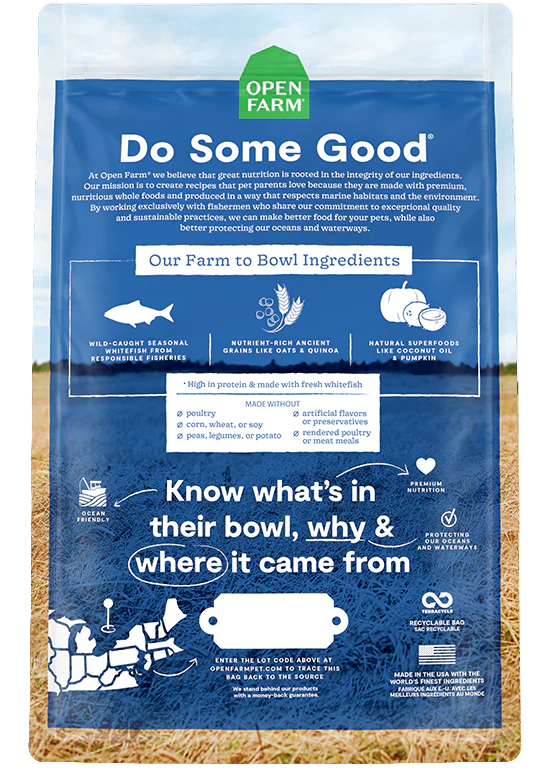 Back view of Open Farm Ancient Grain - Catch of the Season Whitefish Dog Food bag displaying nutritional information and ingredient transparency.